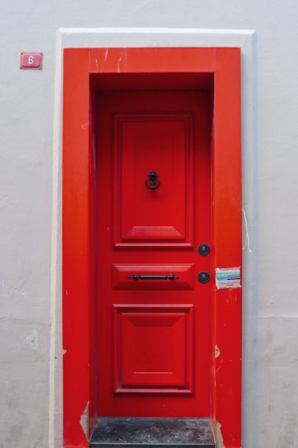 Red door opening into a building